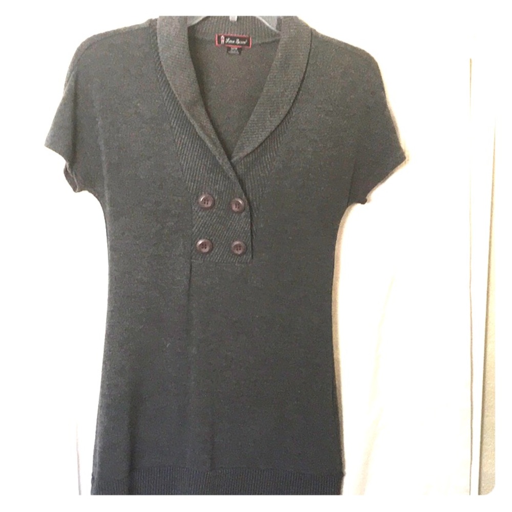 Woman’s grey sweater top